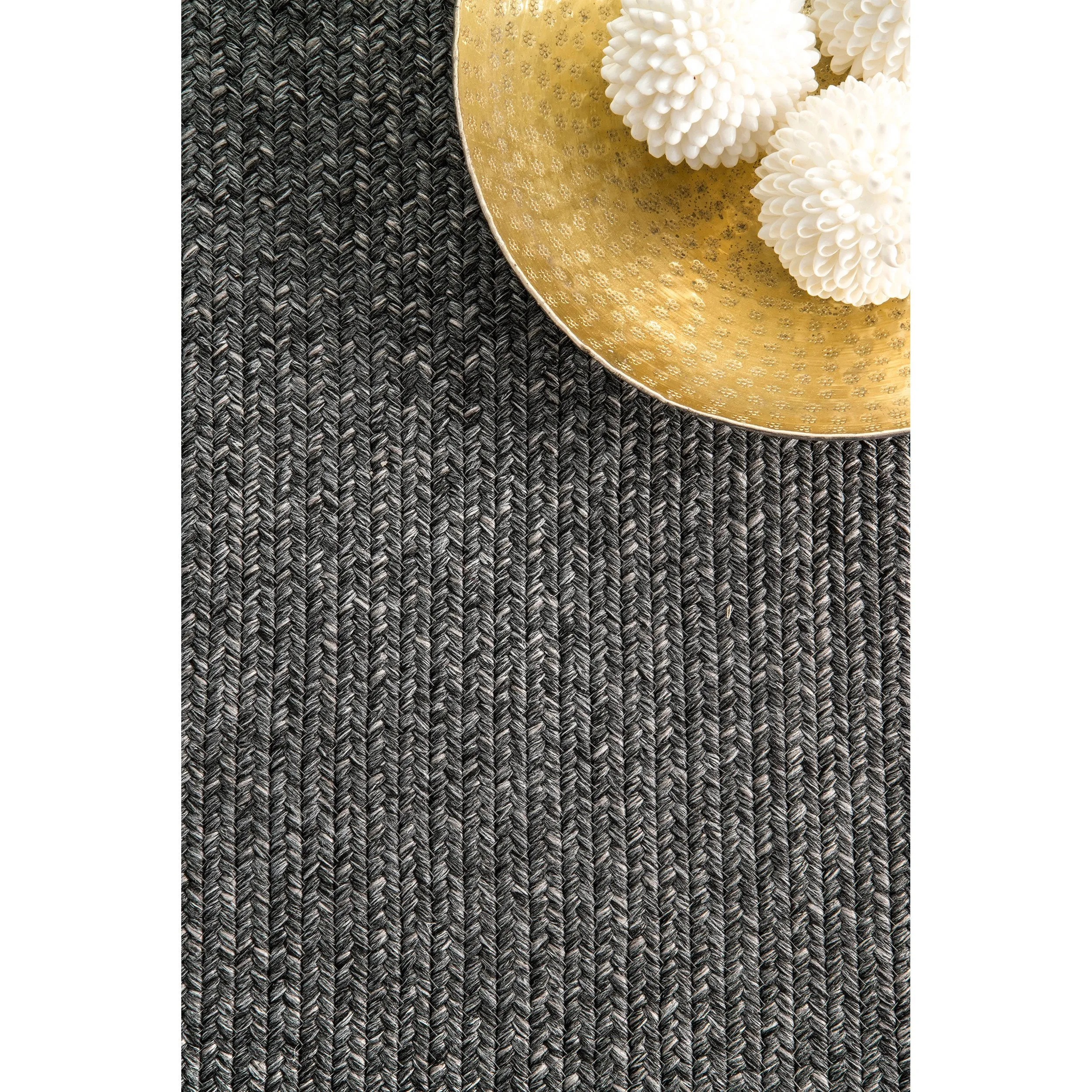 BRAIDED COURT TASSEL PEPPER RUG