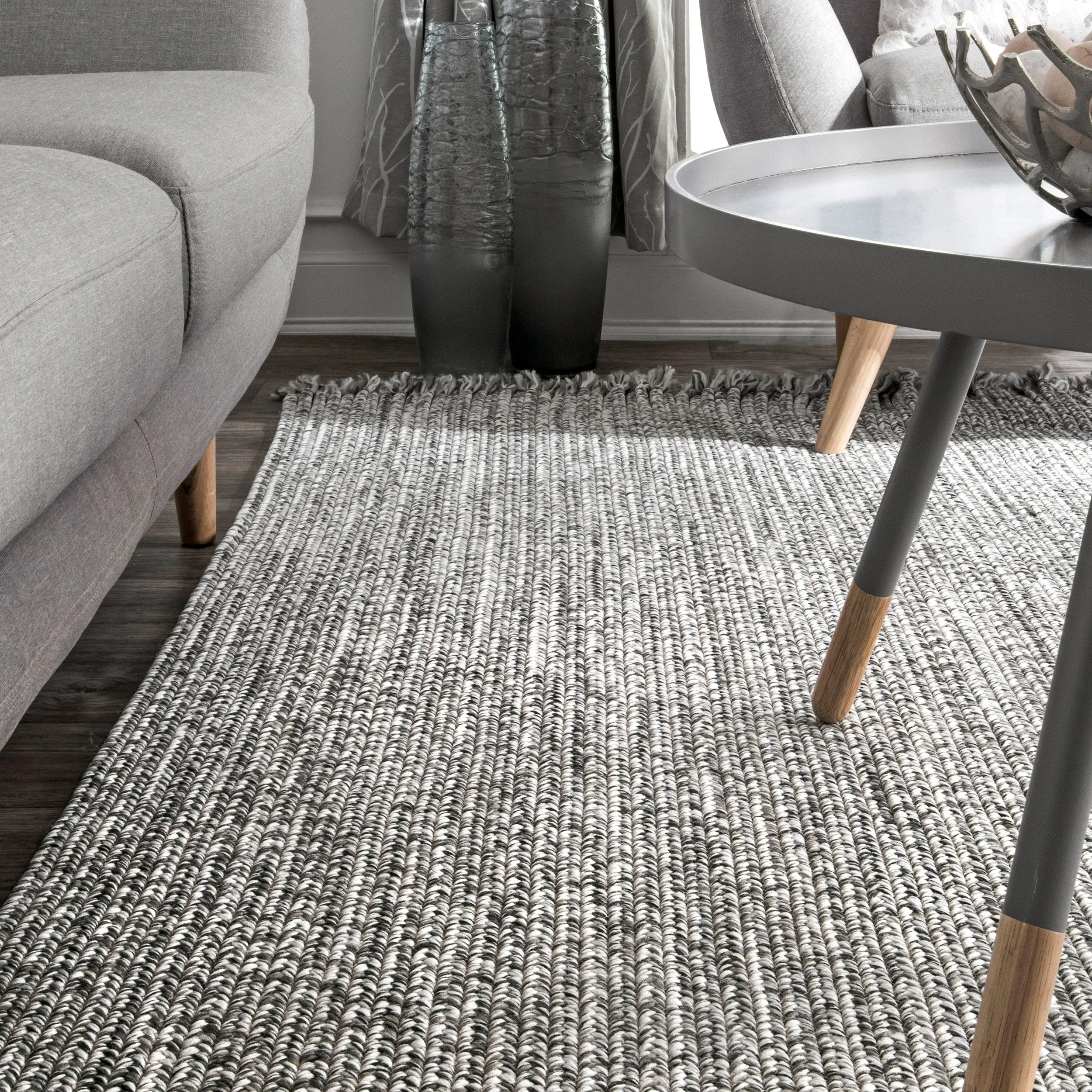 BRAIDED COURT TASSEL PEPPER RUG