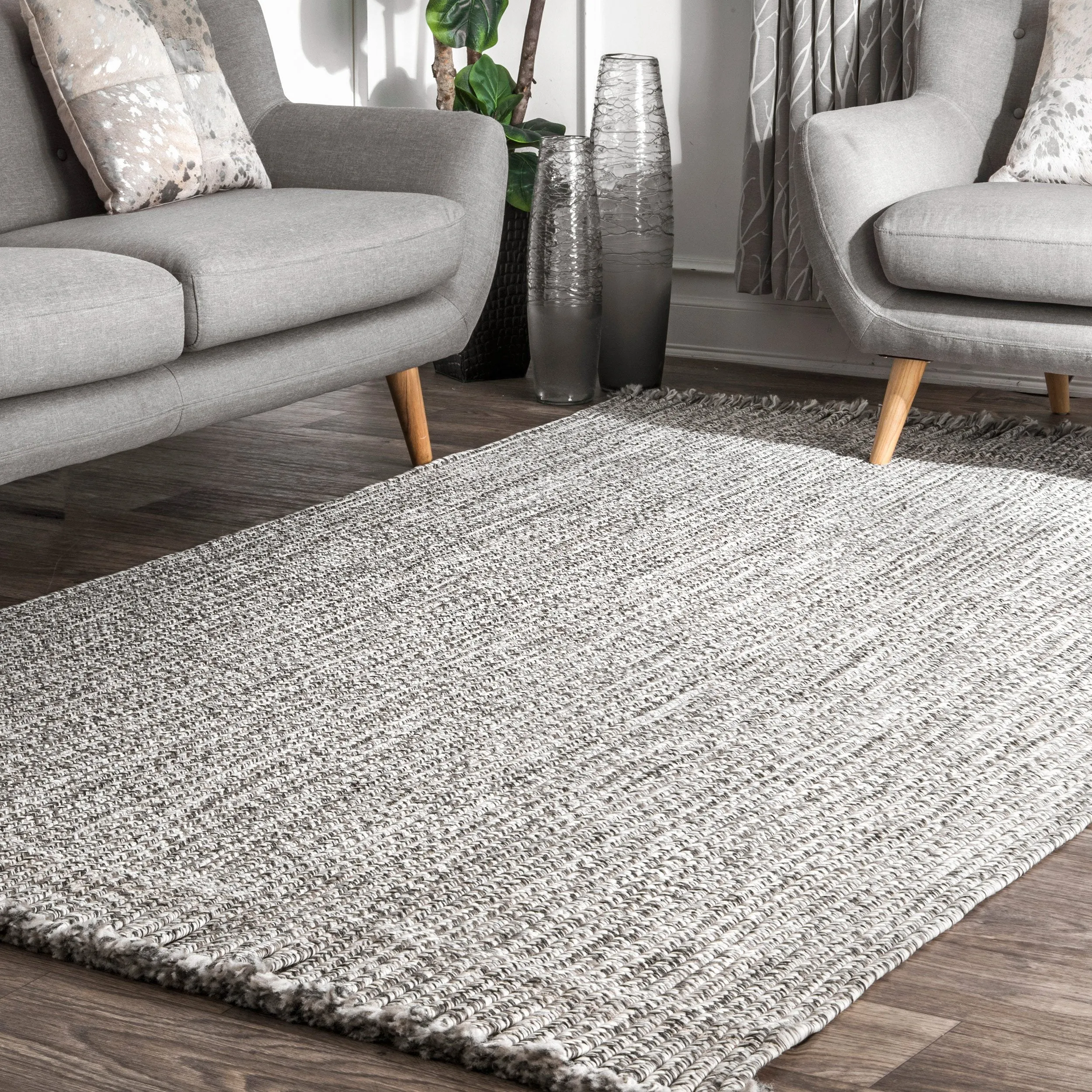 BRAIDED COURT TASSEL PEPPER RUG