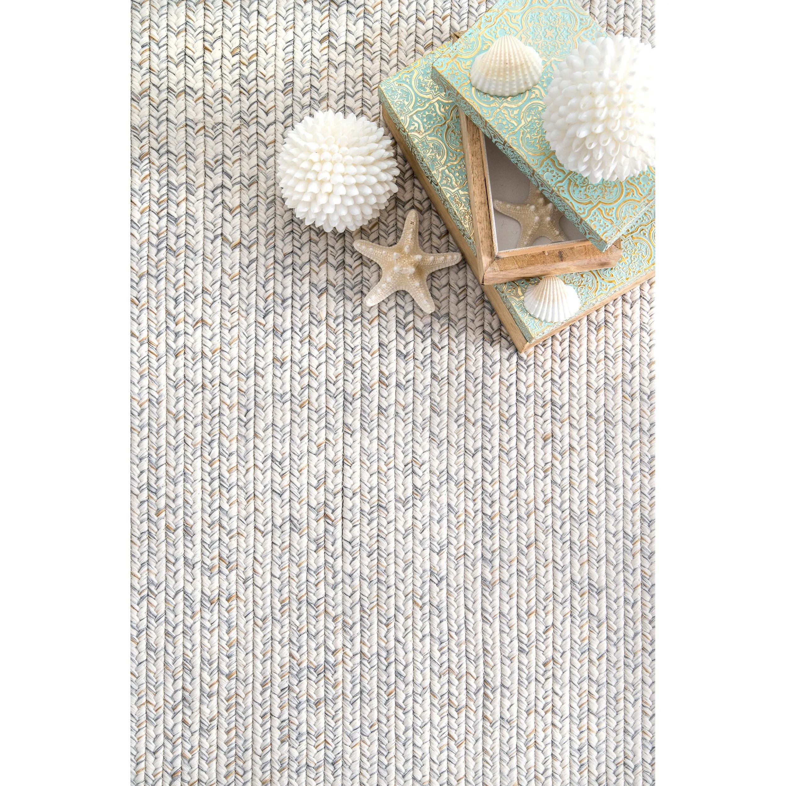 BRAIDED COURT TASSEL PEPPER RUG