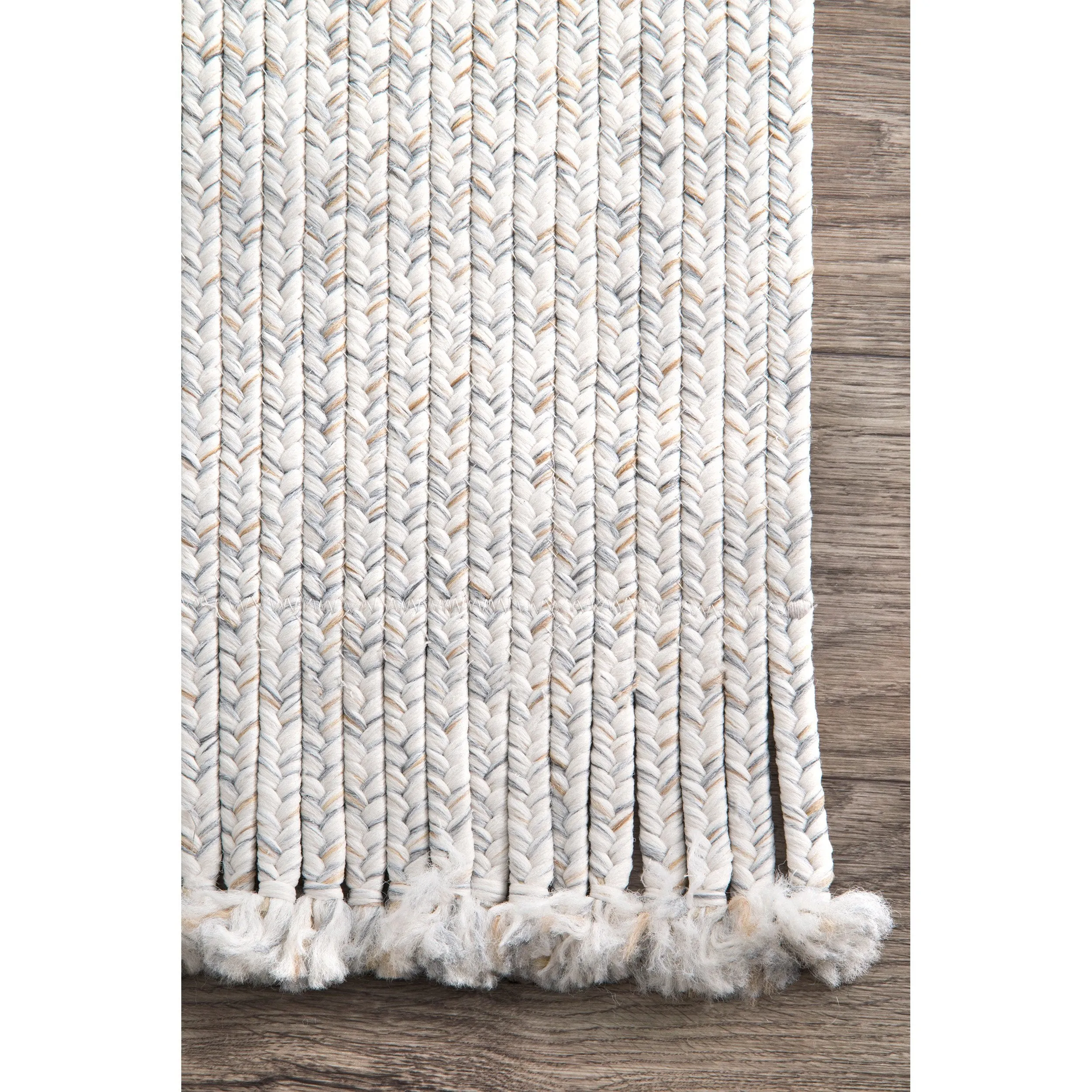 BRAIDED COURT TASSEL PEPPER RUG