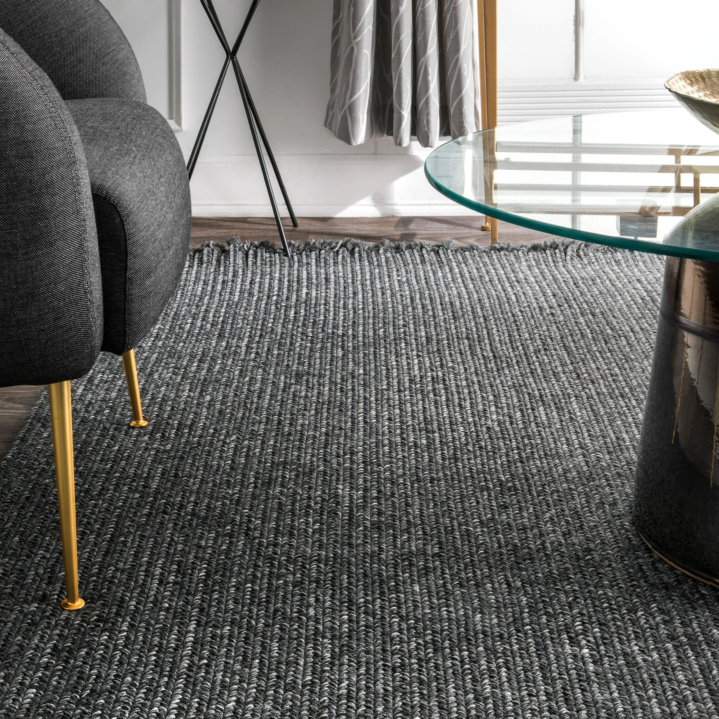 BRAIDED COURT TASSEL PEPPER RUG