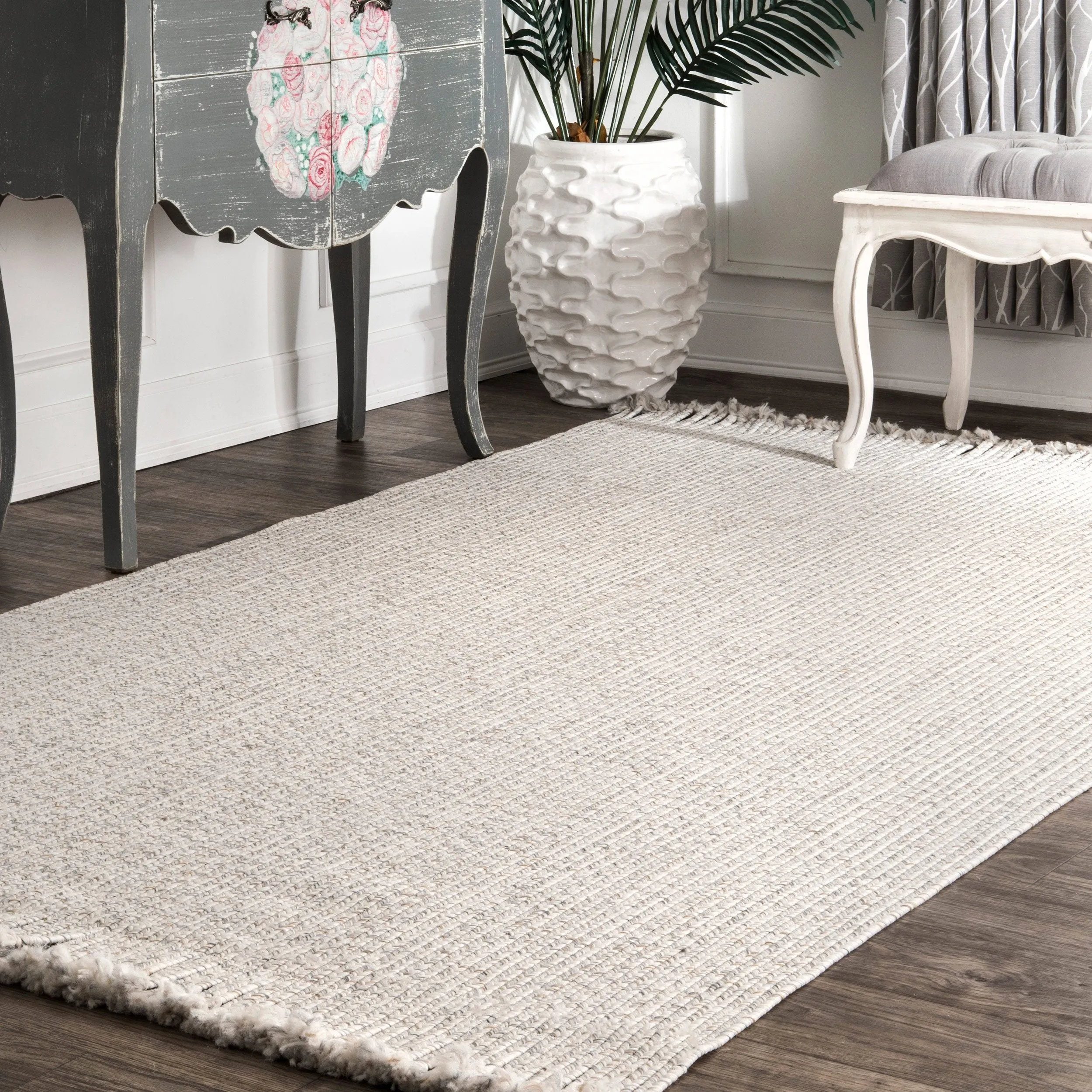 BRAIDED COURT TASSEL PEPPER RUG