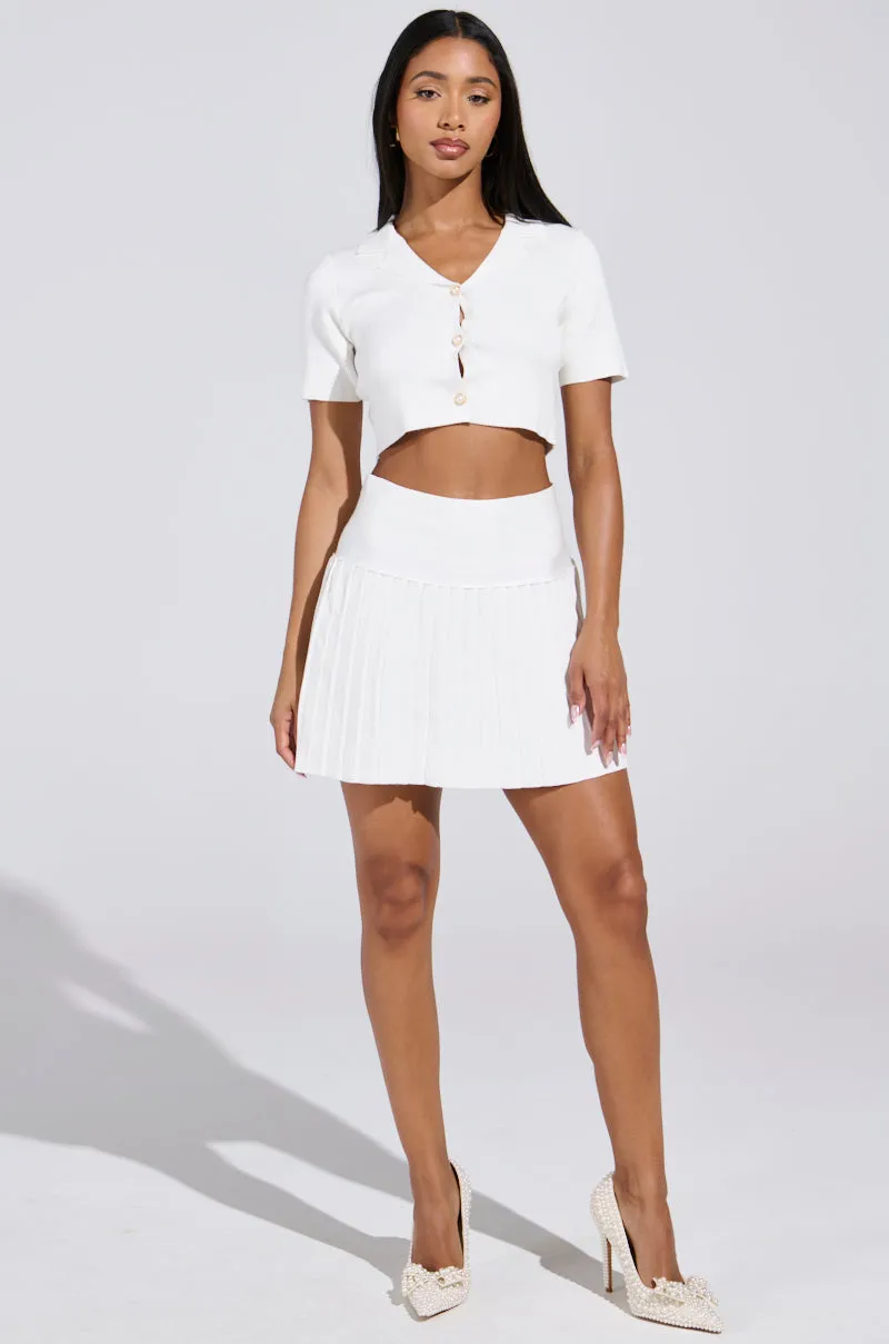 LEMONY EMILY PLEATED MINI SKIRT IN WHITE