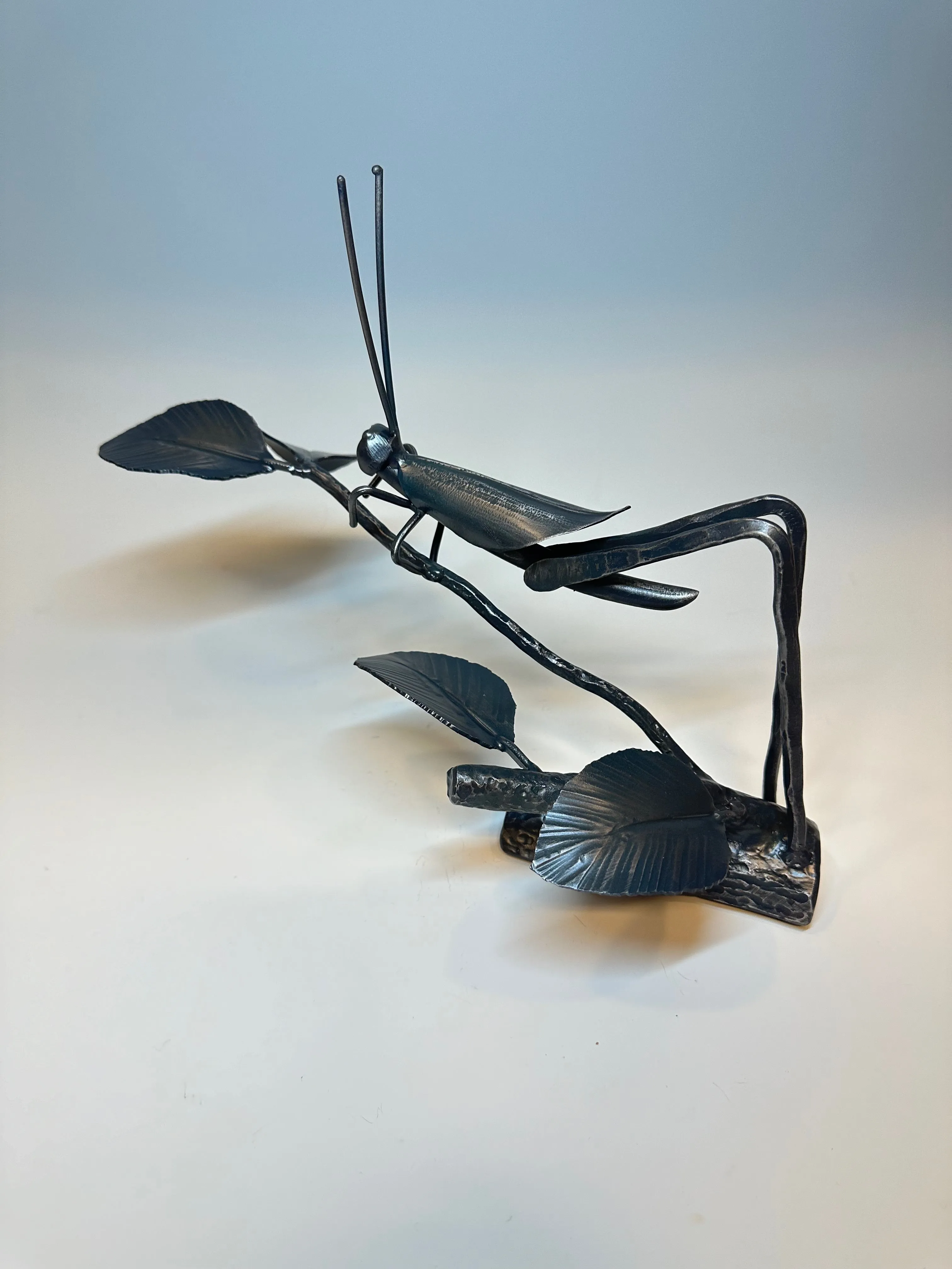 "CRICKET V" HAND FORGED METAL SCULPTURE